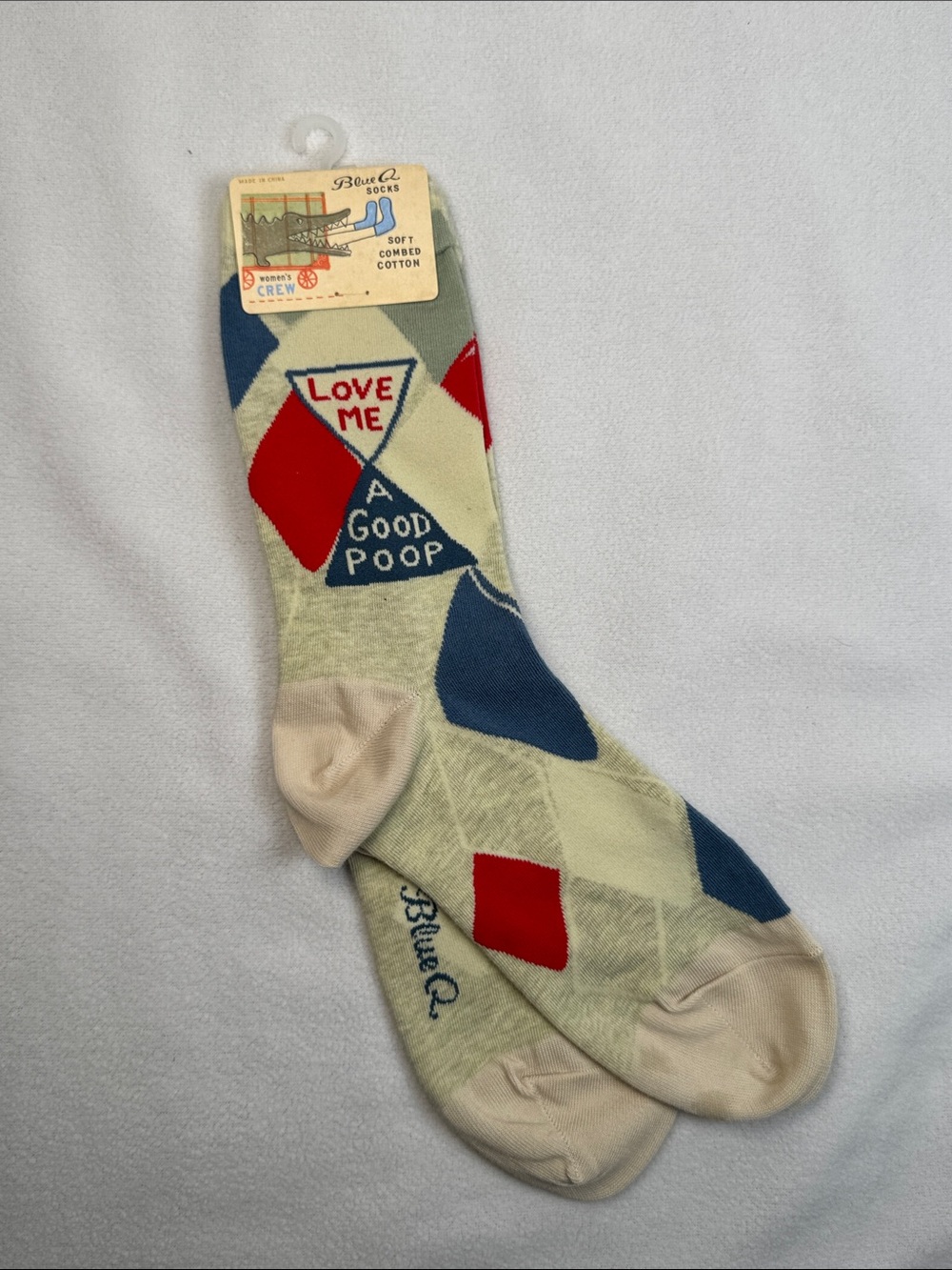 Blue Q Argyle Crew Socks in Cream, Blue & Red with Novelty Text